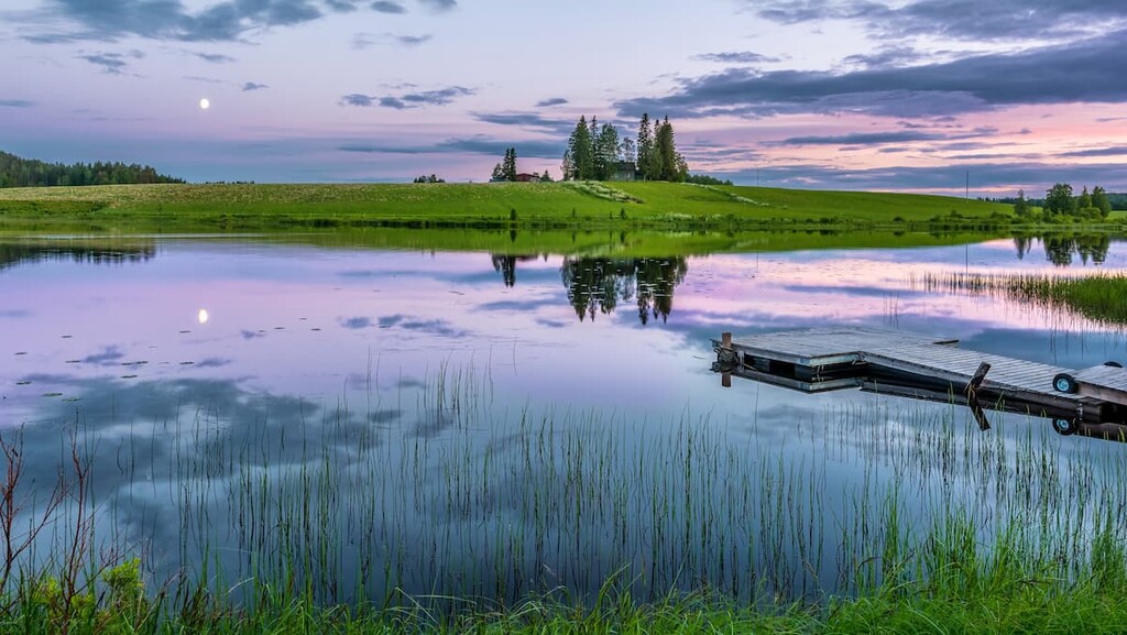 Calm river at midnight in eastern Finland, Finland