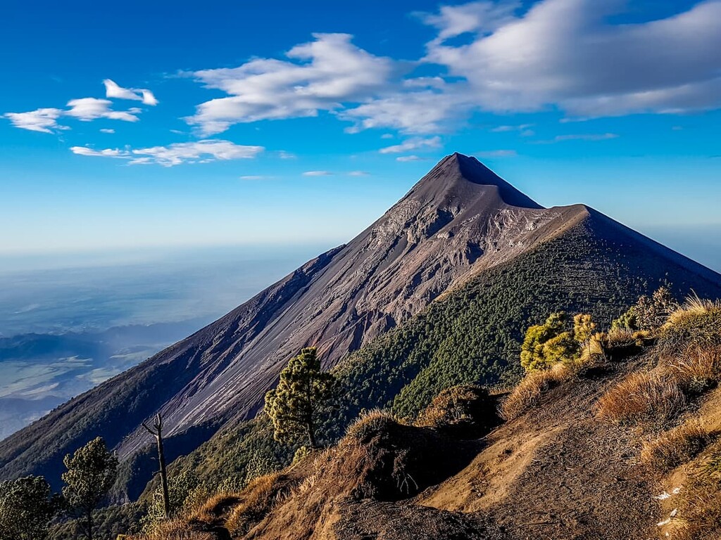 Volcan de Fuego erupts, view from Acatenango trekking trail, Guatemala