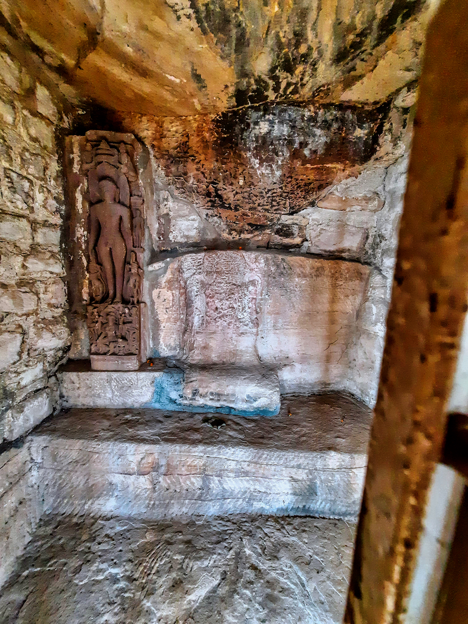 A cave near Vidisha with a Jain Tirthankara statue dating to about 400 CE. Madhya Pradesh Mountain