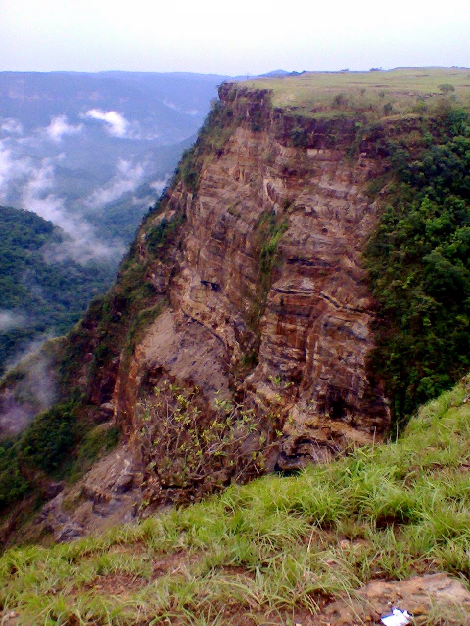The windswept plateaus of Balpakram offer breathtaking views of sparkling rivers and nearby Bangladesh. Meghalaya