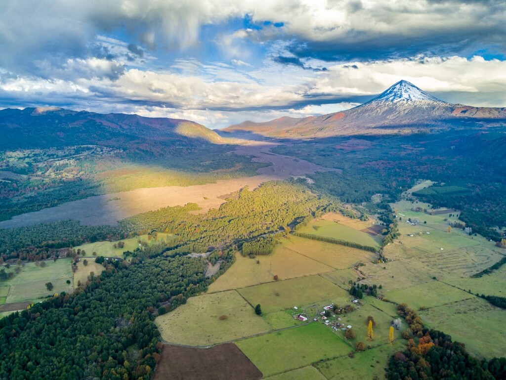 Aerial view of the amazing valleys at Conguillio National Park with the impressive Llaima Volcano dominating the park, Temuco, Chile