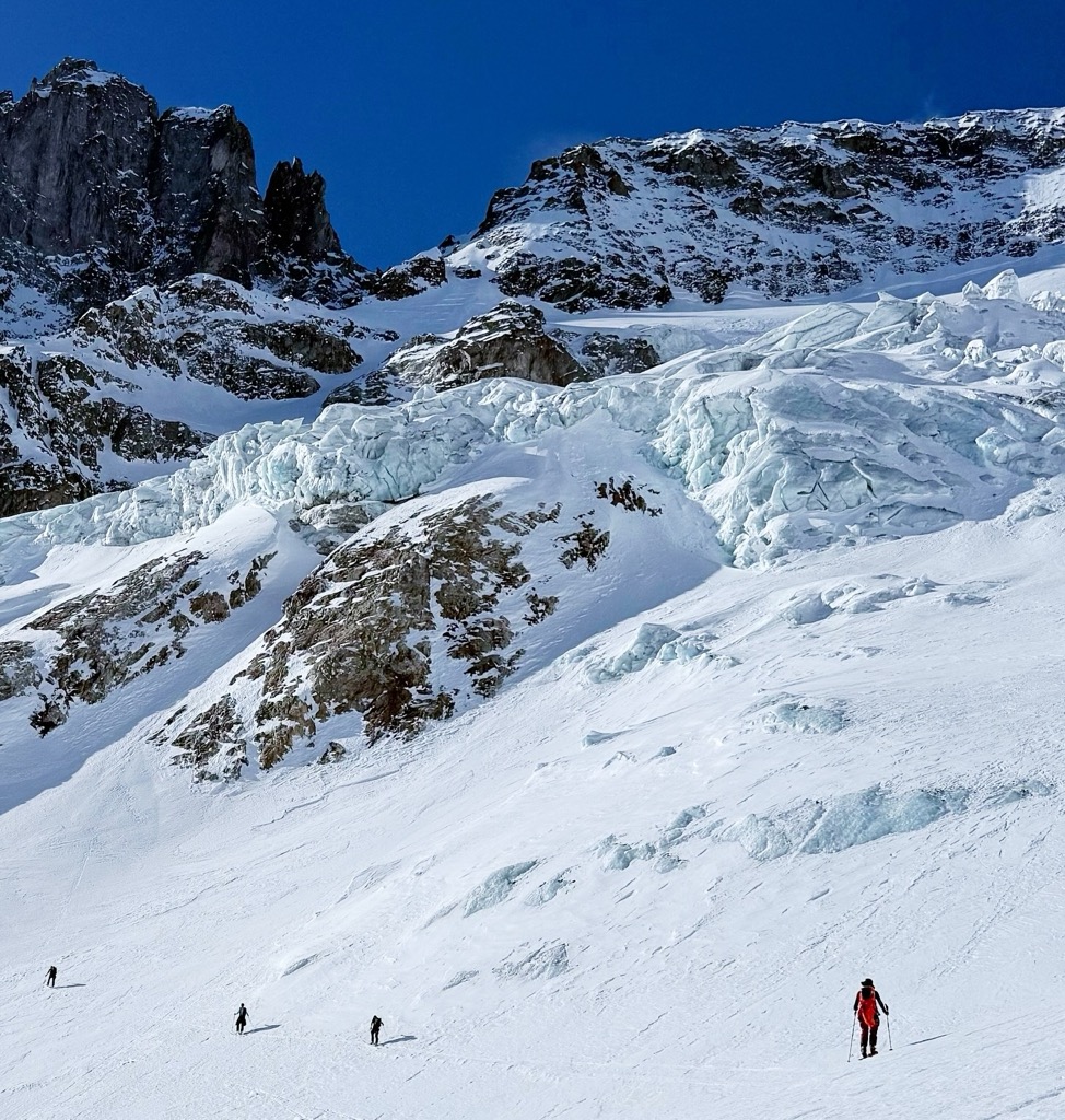 Just a few years ago, you’d be passing over the Glacier de Lautaret, but the glacier has receded, and now you must pass below the seracs. Photo: Ella Lochead. Journal des Ecrins: Col Claire Ski Descent