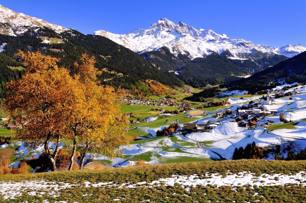 Piz d'Err (3,378 m / 11,083 ft) from behind Savognin and Parsonz in the Oberhalbstein Alps. Albula Alps