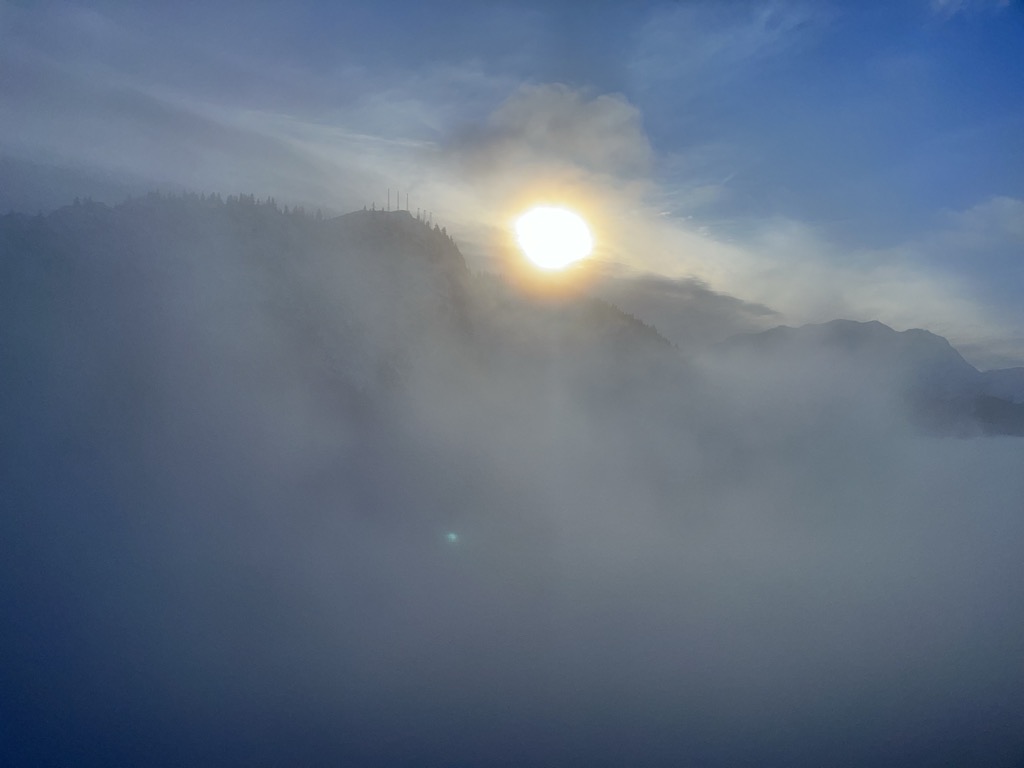 Sunset through the fog. Photo: Sergei Poljak. Alpe d Huez Ski Resort