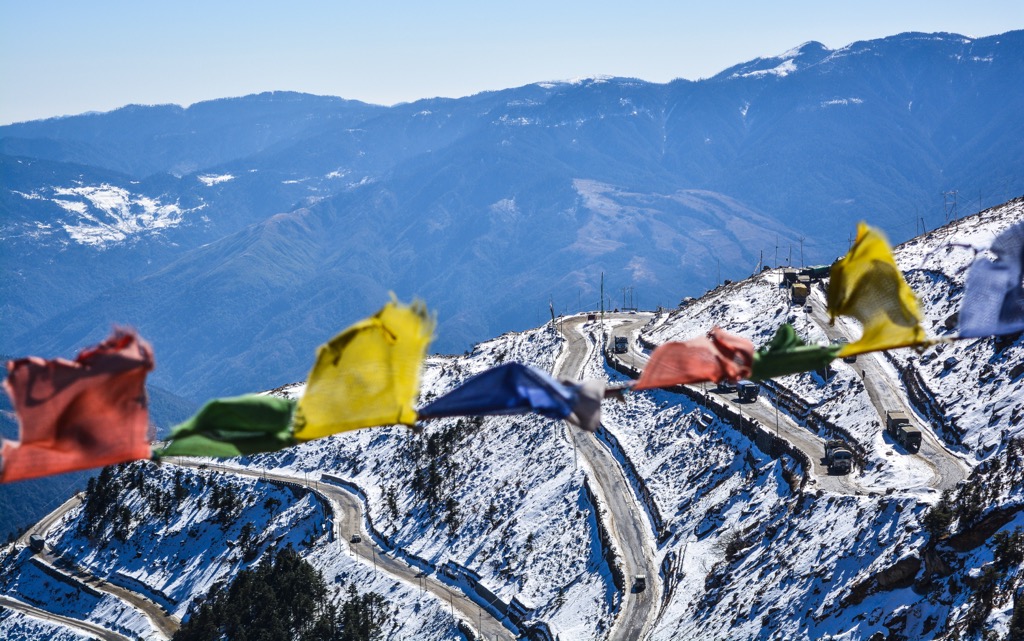 Arunachal Pradesh.  Sela Pass in a blur of Tibetan Prayer Flags