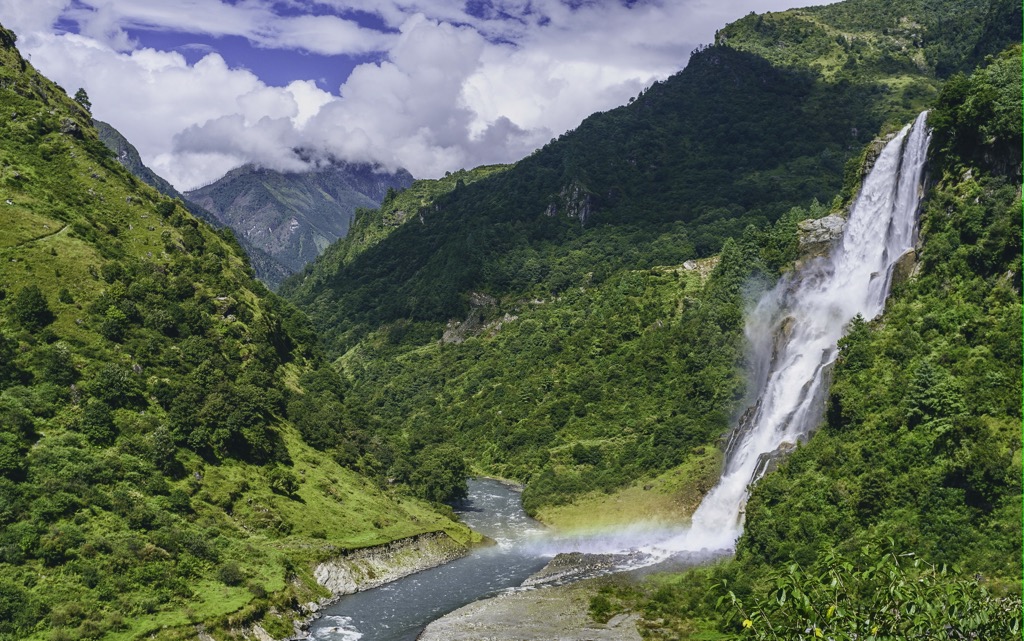 Arunachal Pradesh. waterfall flowing into the Kameng River