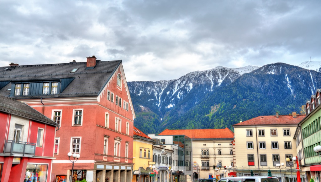 Spittal an der Drau’s historic buildings with the Nock Mountains in the background. Carinthia