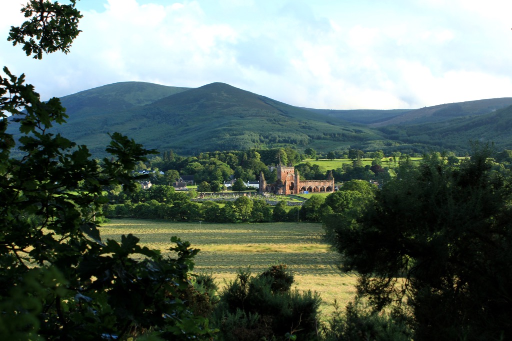 The 13th-century Sweetheart Abbey with Criffel in the backdrop. Dumfries and Galloway