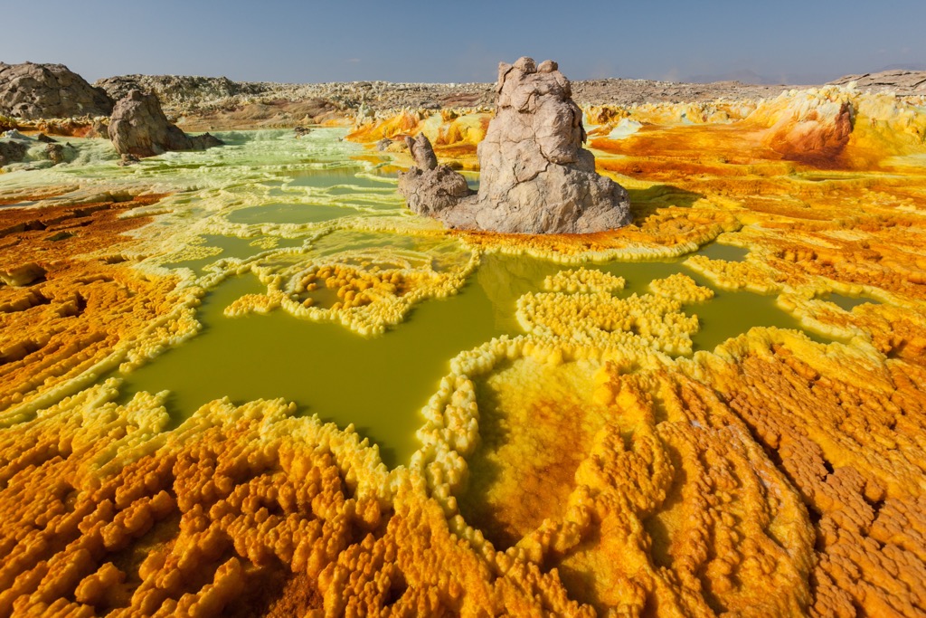 The Danakil Depression is an area of volcanic sulfur lakes and is part of the Afar Triangle. Ethiopia Mountains