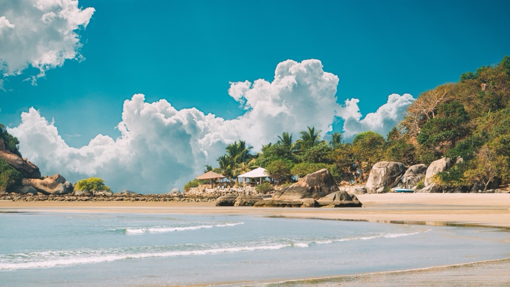 Sandy Palolem Beach Along the Arabian Sea. Goa Mountains