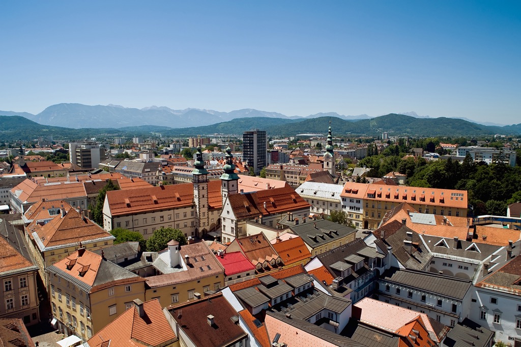 Klagenfurt am Wörthersee’s skyline. Julian Alps and Prealps