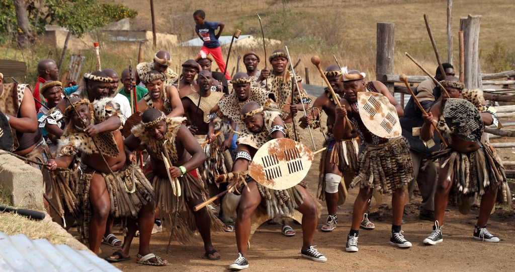 Men performing a traditional Zulu war dance at a wedding in KwaZulu-Natal. KwaZulu-Natal