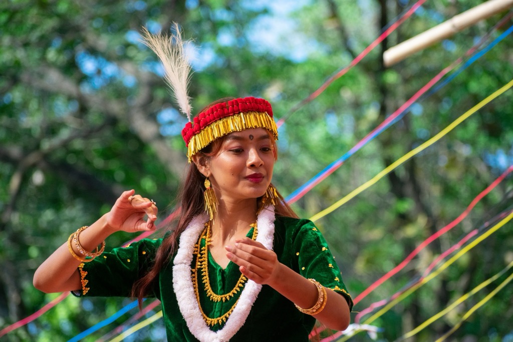 A Meitei woman performing a traditional folk dance. Manipur Mountains