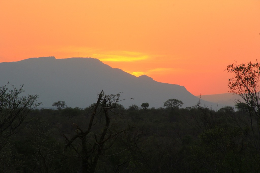 The sun setting over the mountains of Kruger National Park. Mopani District Municipality