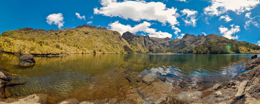 An alpine lake in the Mount Wilhelm wilderness, where you travel from dense, steamy rainforests to alpine grasslands. Papua New Guinea