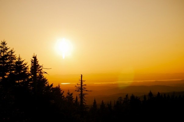 Looking out at the sun setting over Lake Champlain, from the Stark's Nest at Mad River Glen