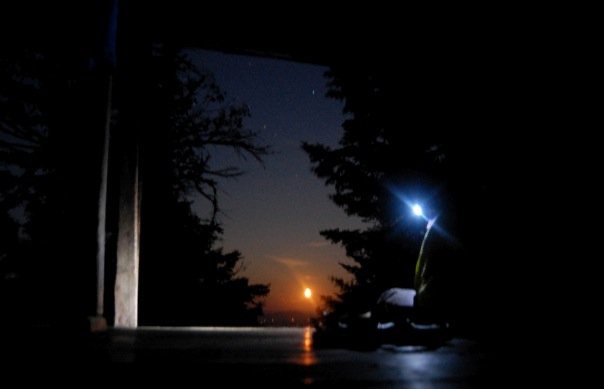 Harvest moon reflecting off the floor of the lean-to