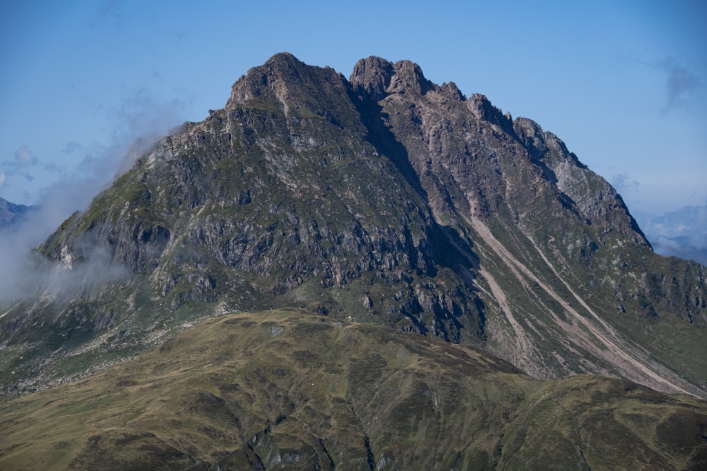 The Großer Rettenstein summit structure is made of dolomite and sits atop a 400 m (1,312 ft) thick slab of quartz phyllite. Tyrol Schistose Alps