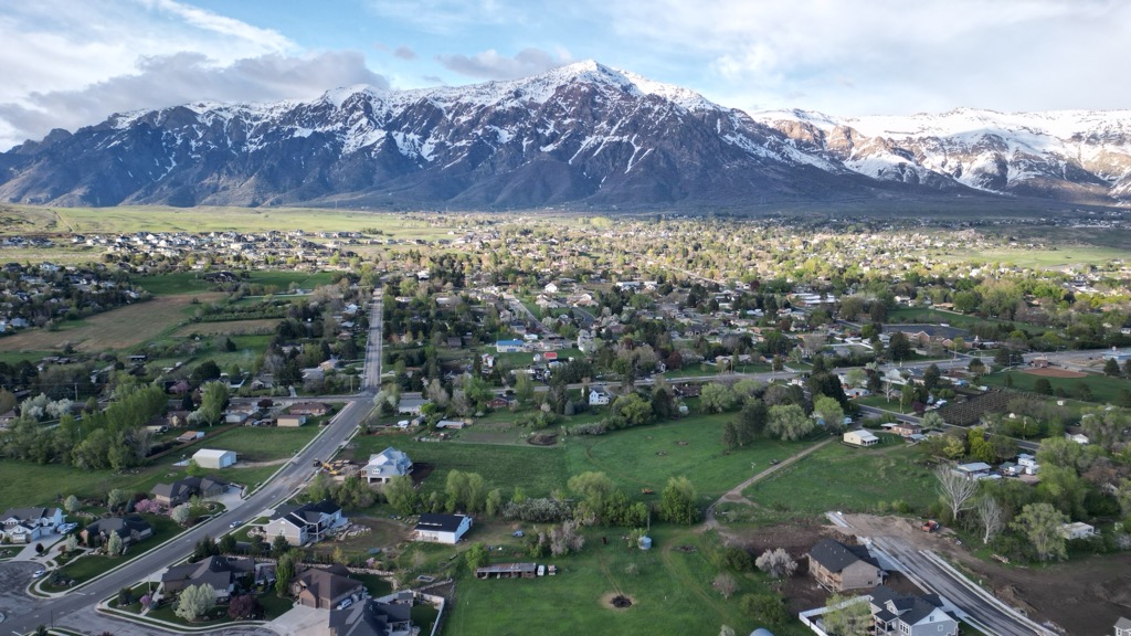 The summit of Ben Lomond towers over the town of Pleasant View, UT. Weber County