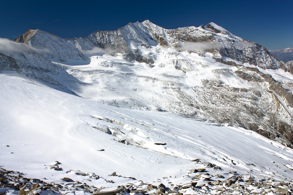 The view from the slopes of Hochfeiler in the morning sun. Zillertal Alps