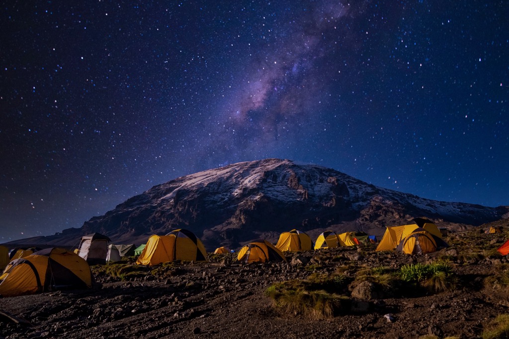 Best hiking. The summit of Mount Meru, with Kilimanjaro in the background