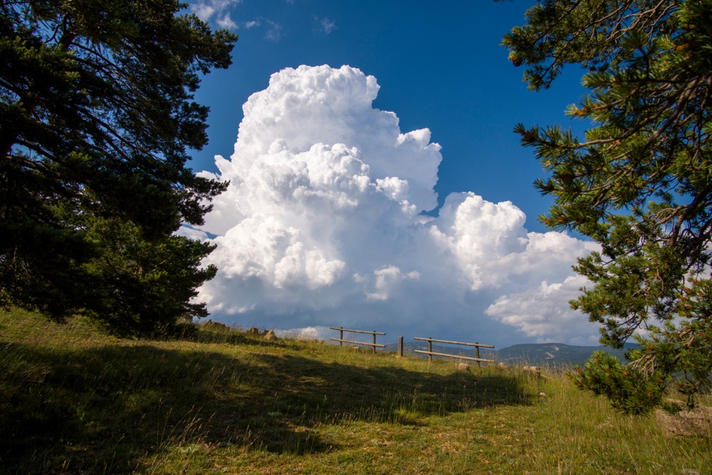 Cumulonimbus clouds forming over the mountains of Spain. Mountain Weather