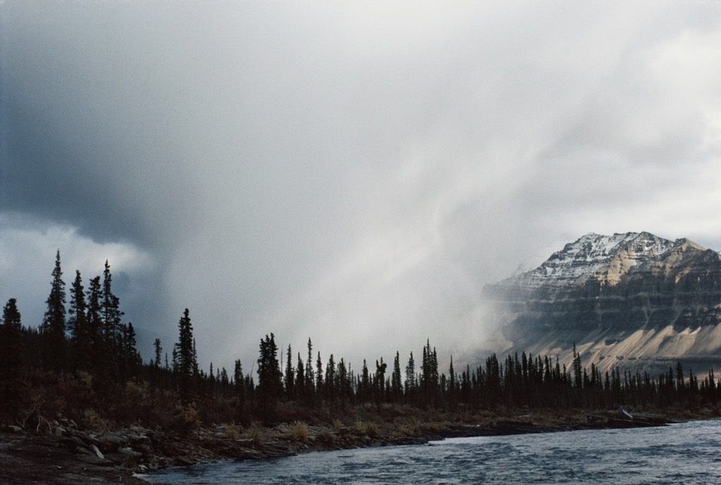 A late summer snow squall in northern Canada. Mountain Weather