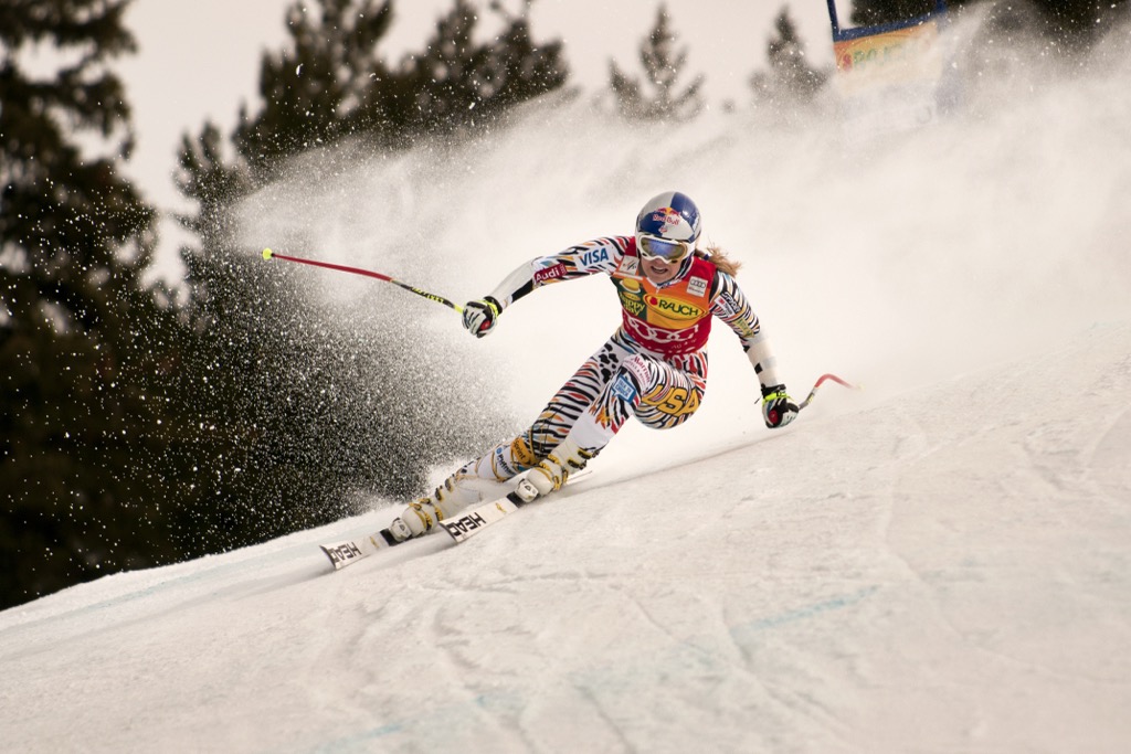Lindsay Vonn using her edge to carve in the FIS World Cup Super G. Mastering the perfect turn is a lifetime’s pursuit in skiing. Should I Ski or Snowboard?