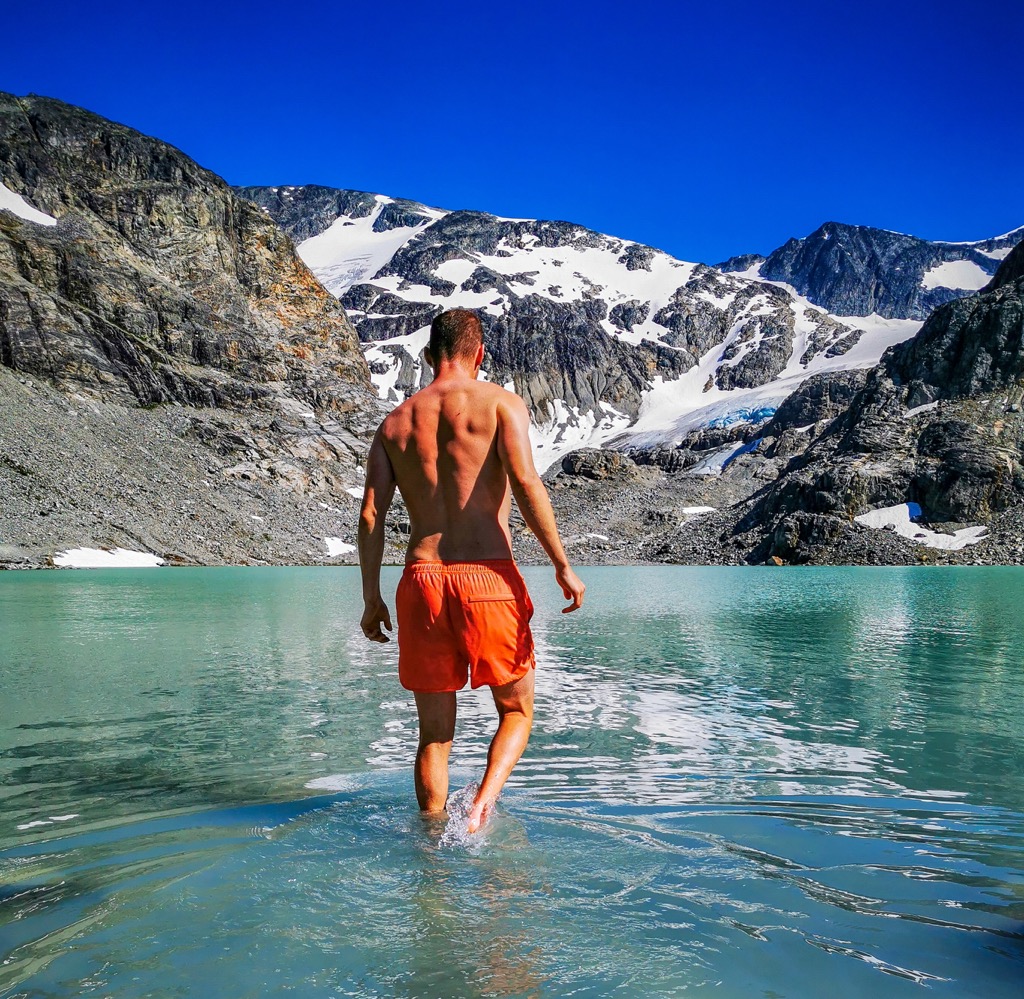 The ice-cold waters of Wedgement do wonders for the muscles. Photo: Anthony Butt. Wedgemount Lake