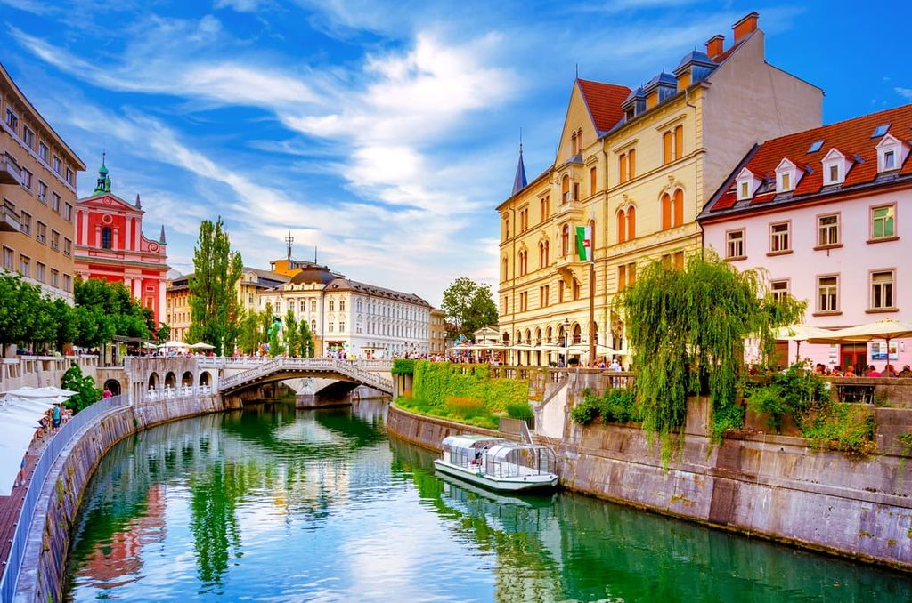 Ljubljana Tromostovje Ljublianica river Church, Slovenia