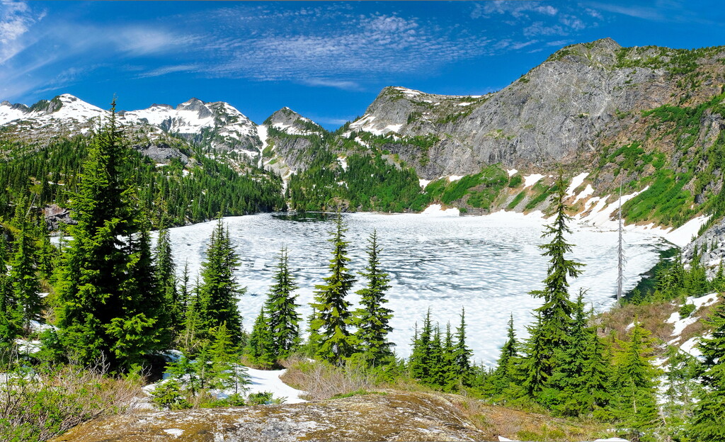Frozen Thorton Lake and Trappers Peak. North Cascades National Park, Washington