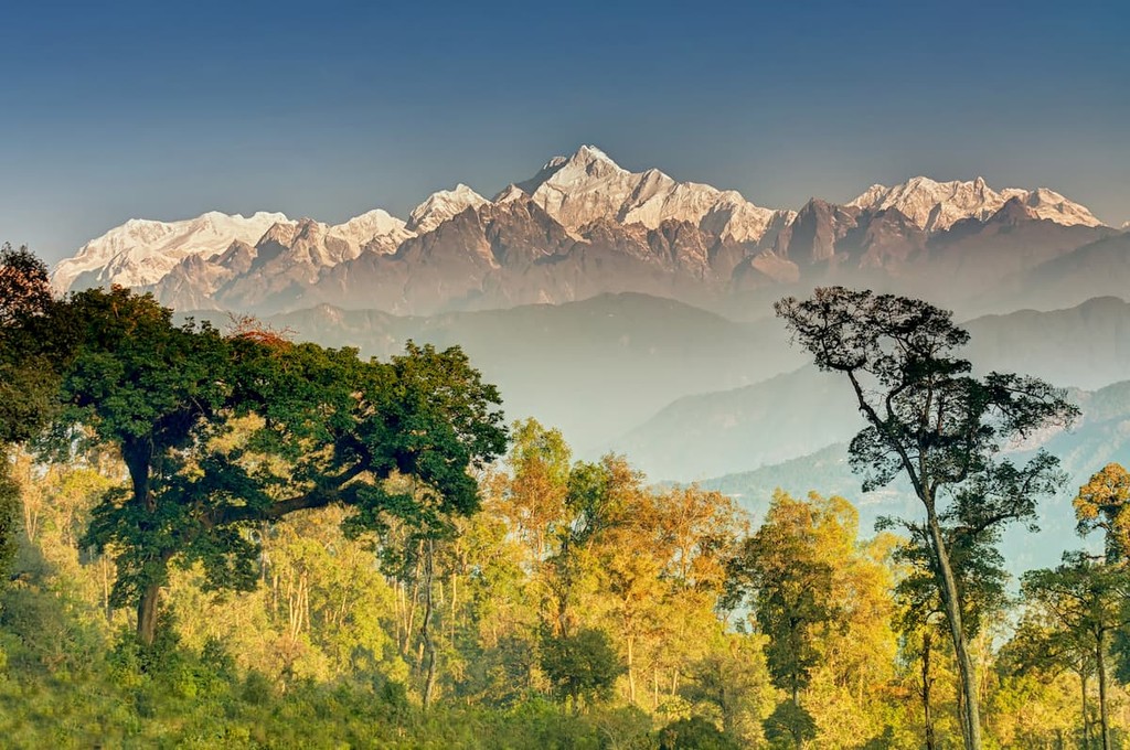 Beautiful view of Silerygaon Village with Kanchenjunga mountain range at the background, moring light, at Sikkim, India