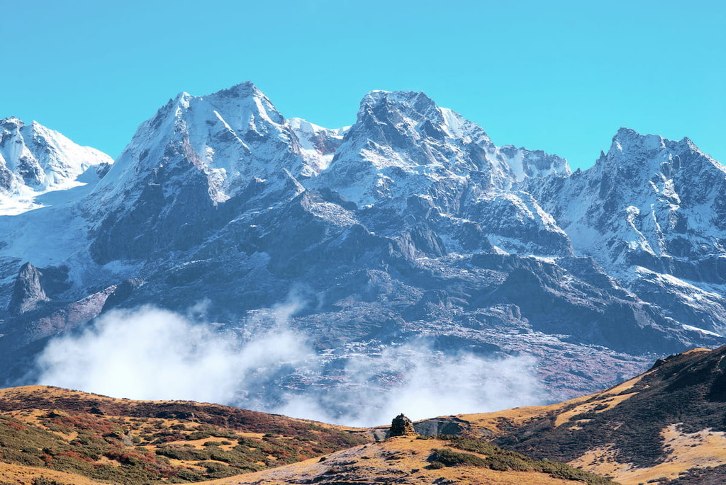 Top of High mountains, covered by snow. Kangchenjunga, Sikkim, India