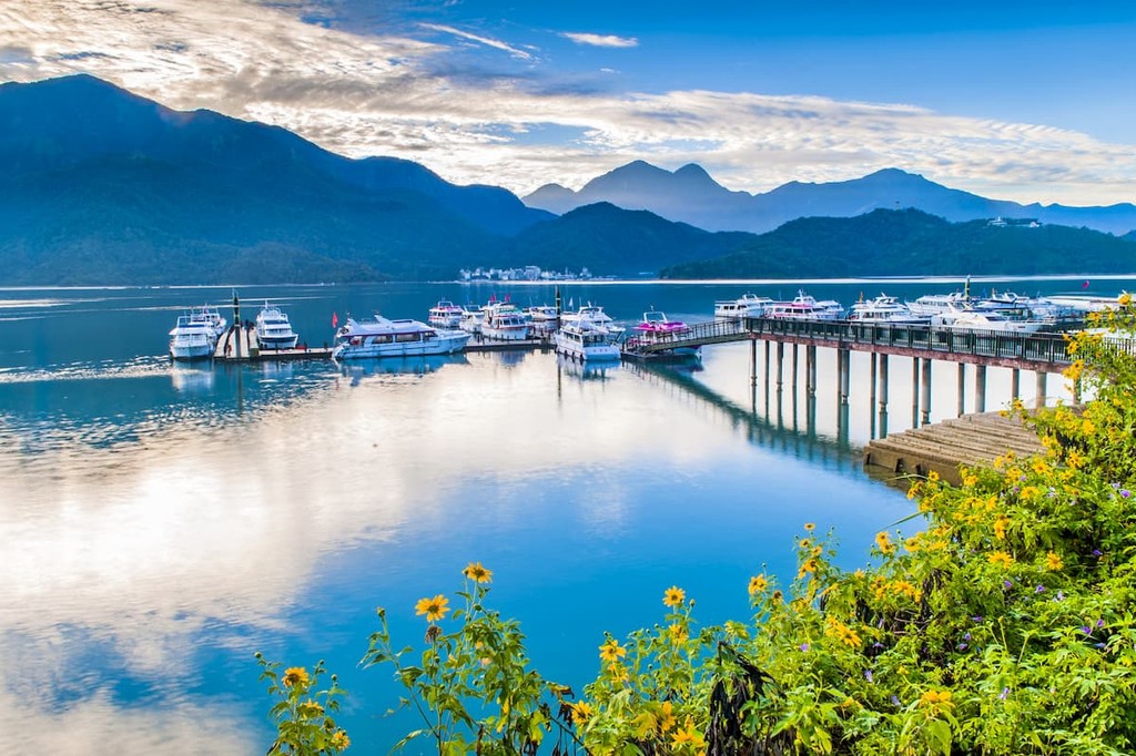 Turquoise Sun Moon Lake with Central Mountain Ranges in the background,, Taiwan